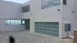 Contemporary Aluminum & White Laminate (Privacy) Glass Garage Door