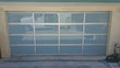 Contemporary Aluminum & White Laminate (Privacy) Glass Garage Door