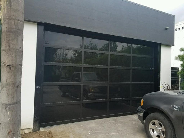 Contemporary Black Aluminum & Black Laminate (Privacy) Glass Garage Door