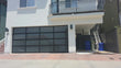 Contemporary Aluminum & White Laminate (Privacy) Glass Garage Door