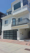 Contemporary Aluminum & White Laminate (Privacy) Glass Garage Door