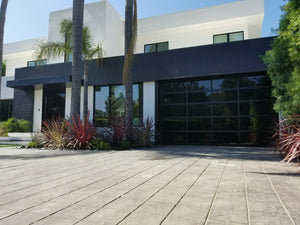 Contemporary Black Aluminum & Black Laminate (Privacy) Glass Garage Door