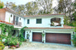 Caprice - Spanish Style Custom Wood Garage Door