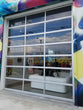 Contemporary Aluminum & Clear Tempered Glass Garage Door
