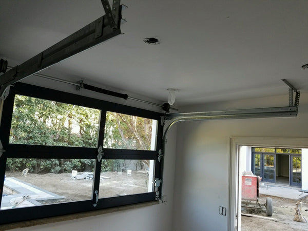 Contemporary Aluminum & Clear Tempered Glass Garage Door