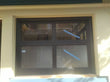 Contemporary Aluminum & Clear Tempered Glass Garage Door