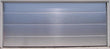 Grand - Modern Style Custom Wood Garage Door with Brushed Aluminum Overlay