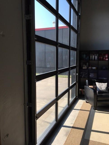 Contemporary Aluminum & Clear Tempered Glass Garage Door