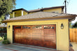 Noel - Spanish Style Custom Wood Garage Door