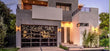Contemporary Black Aluminum & Black Laminate (Privacy) Glass Garage Door