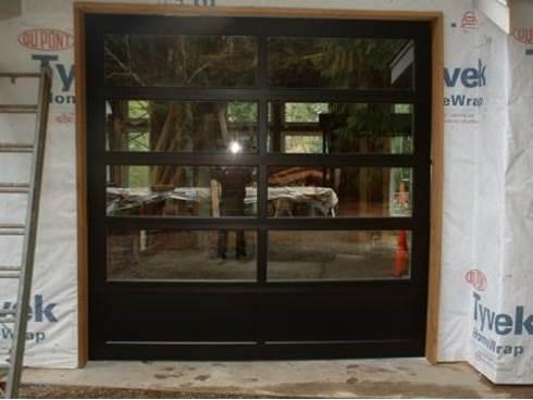 Contemporary Aluminum & Clear Tempered Glass Garage Door