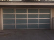 Contemporary Aluminum & White Laminate (Privacy) Glass Garage Door