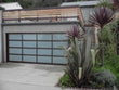 Contemporary Aluminum & White Laminate (Privacy) Glass Garage Door