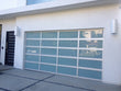 Contemporary Aluminum & White Laminate (Privacy) Glass Garage Door