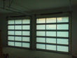 Contemporary Aluminum & White Laminate (Privacy) Glass Garage Door